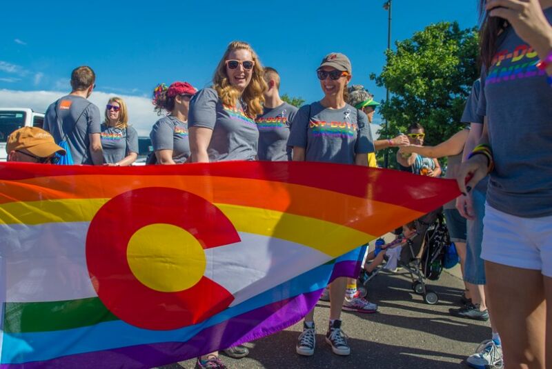 Participants In The Pridefest Parade Make Their Way Through Downtown Denver Credit Evan Semon